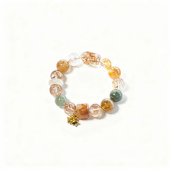 BodhiPulse ‘Flowing Light and Harmonious Rhyme’ 15-bead natural crystal bracelet from The Seven Jewels Pure Land Collection, in orange, red, and green.
