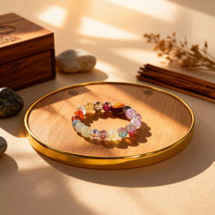 Sky-inspired multicolor glass bracelet by BodhiPulse, illuminated by soft light, representing celestial harmony and fluid beauty for mindful healing.